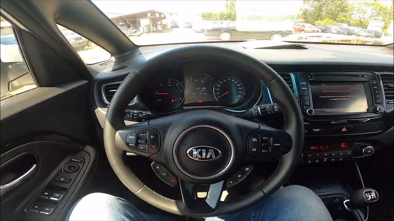 Jak włączyć ogrzewanie kierownicy w Kia?